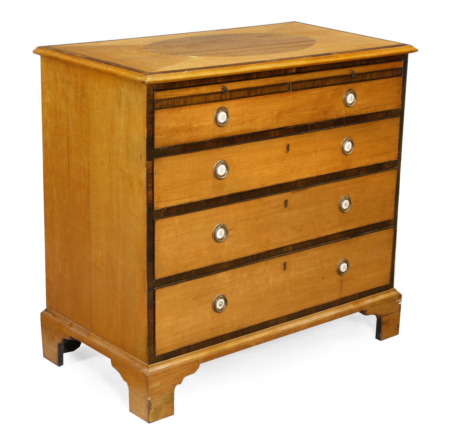 A George III satinwood and banded chest of drawers, circa 1800, in the manner of Gillows of