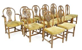 A set of twelve mahogany dining chairs in George III style, 20th century, to include a pair of