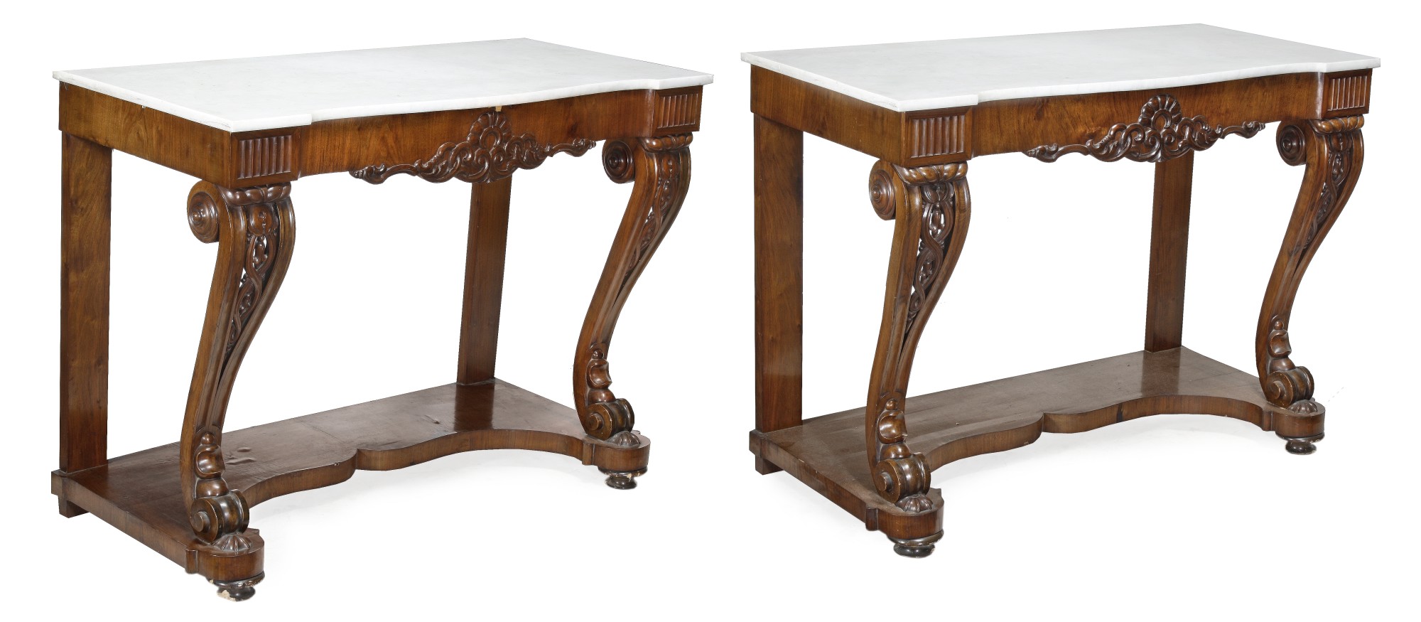 A pair of French walnut and carrara marble mounted console tables, circa 1850, each serpentine