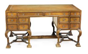 A rosewood and satinwood marquetry partners’ desk, late 19th/early 20th century, in the manner of