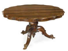 A Victorian rosewood centre table, circa 1880, circular top with serpentine shaped edge, octagonal