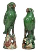 Two similar Continental green-glazed pottery models of birds in the Chinese style, 22cm & 25cm high