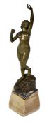 ... Titze (German, early 20th century), a bronze figure, of a standing nude awakening, light greeny