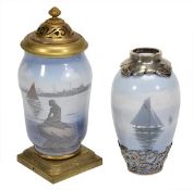 A Royal Copenhagen ovoid vase with silver coloured mounts, painted with sailing boats and seagulls,