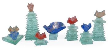 Ann Wood, six glass candle holders and a bowl, variously painted, each on stacked squares bases,