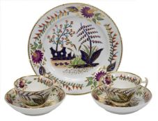 A pair of Derby ‘London’ shape teacups and saucers, decorated with a stylised chinoiserie garden;