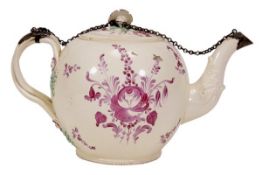 A English creamware silver-coloured metal-mounted globular teapot and cover, painted in puce and