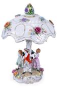 A modern German porcelain (Plaue-on-Havel, Thuringia) figural lamp base and shade, flower-encrusted