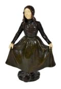 Paul d’Aire, (French, fl.1890-1910), a bronze and ivory figure of a Dutch girl, signed in the