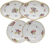 A pair of Spode porcelain shaped oval dishes, moulded in relief and painted with flowers, 26.5cm in