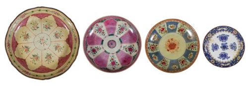 Four Chinese Export famille rose and Imari dishes, variously deocrated with floral compositions