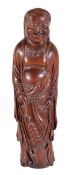 A Chinese hardwood figure of Liu Hai, the long-haired, bare-chested legendary figure stands