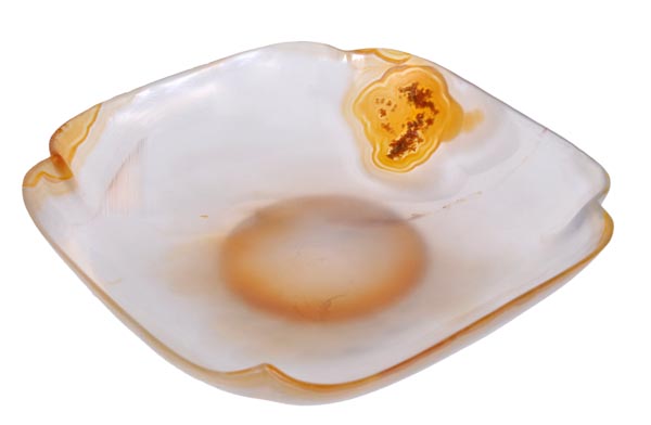 A Chinese agate dish of quatre-lobed form raised on a short foot with concave centre, the almost