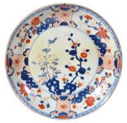 A Chinese Imari charger of dished circular form, decorated in underglaze blue, iron red and gilt,