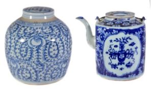 A blue and white lidded jar decorated with blooming lotus scroll, scrolling designs, and keyfret