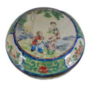 A Chinese Canton enamel box and cover of circular form, decorated with ladies and attendants amid