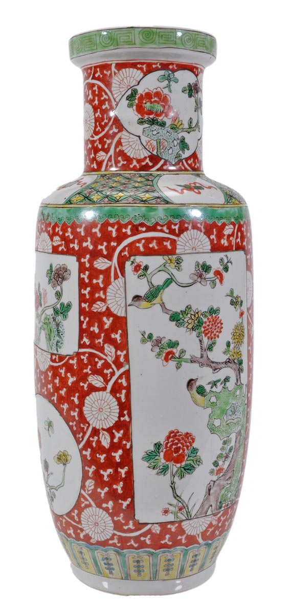 A Chinese famille verte rouleau vase decorated in typical manner on a scrolling floral ground in