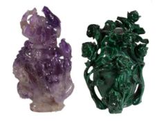 A Chinese amethyst vase and cover and a malachite vase and cover carved, respectively, with