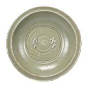 A Chinese Longquan celadon ‘twin-fish’ dish, the exterior with deep rounded sides carved with a