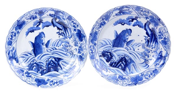 A pair of late Arita chargers, each of multi-lobed circular form decorated in underglaze blue with