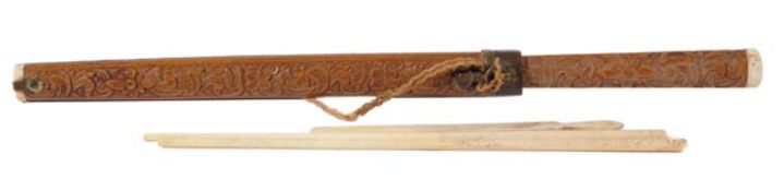 A Chinese eating set, the wood holder carved with floral scrolls, with two ivory chopsticks, 30cm