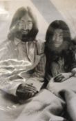 John Lennon and his bride of five days, Yoko Ono, Amsterdam, 1969 Gelatin silver print, printed