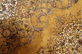 A modern yellow ground Persian style rug 363cm x 280cm