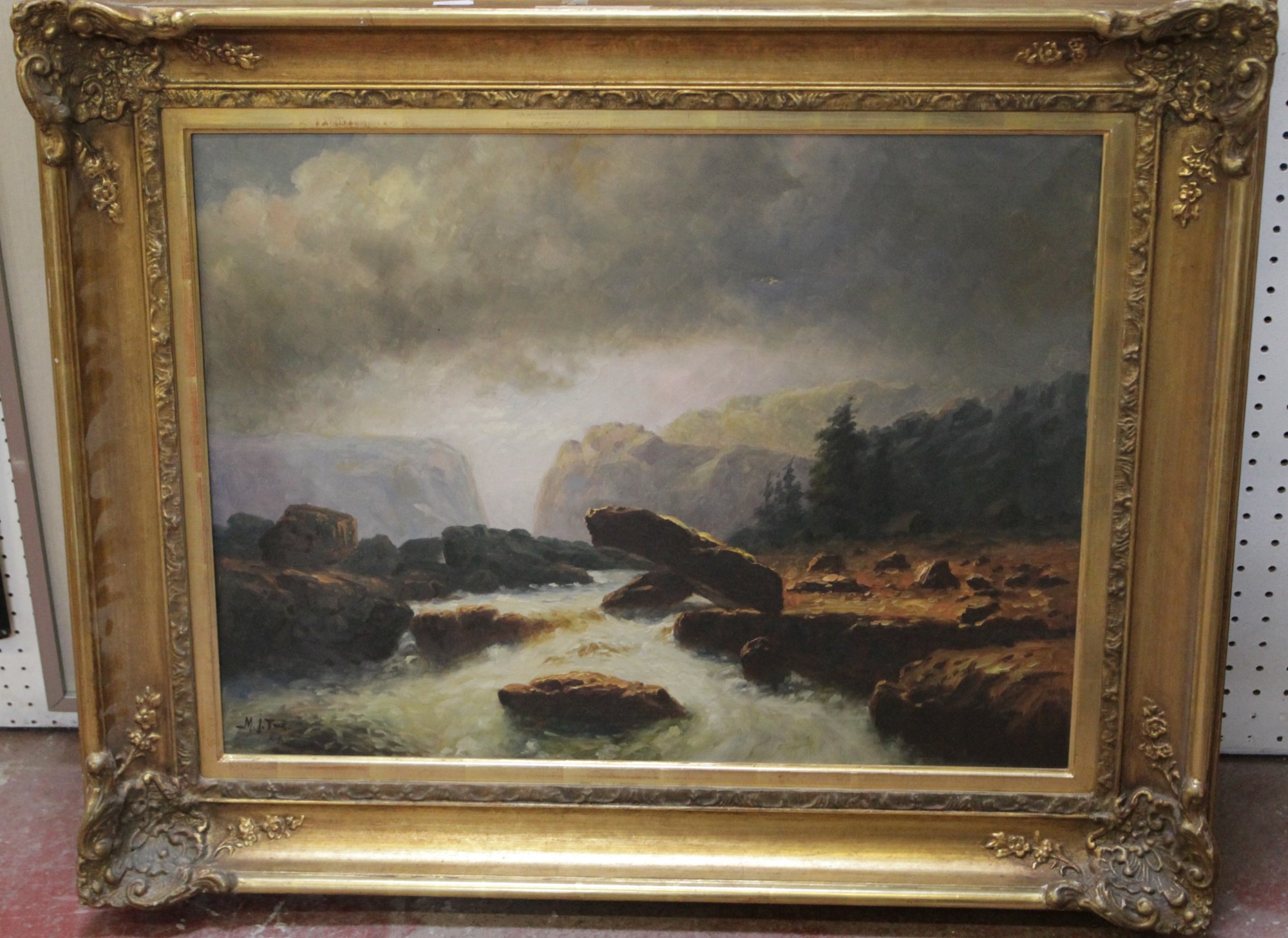19th century school River before a mountainous landscape Oil on canvas Indistinctly signed M.J.T**