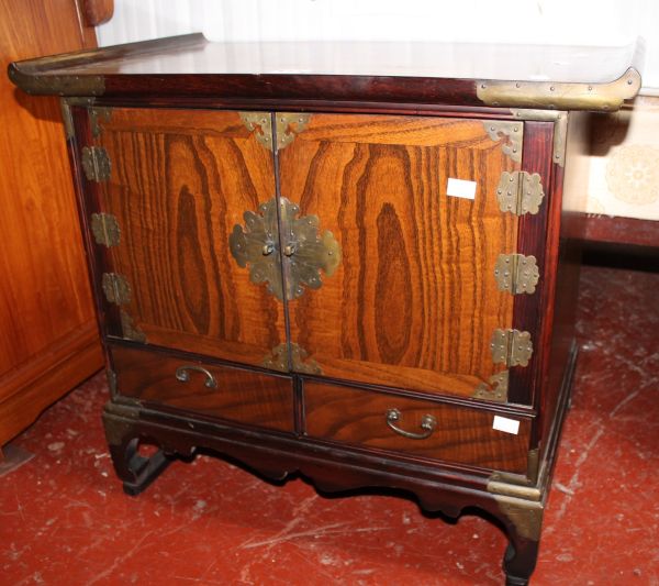 A modern Oriental hardwood cabinet, another similar smaller, two drawer side table and stool