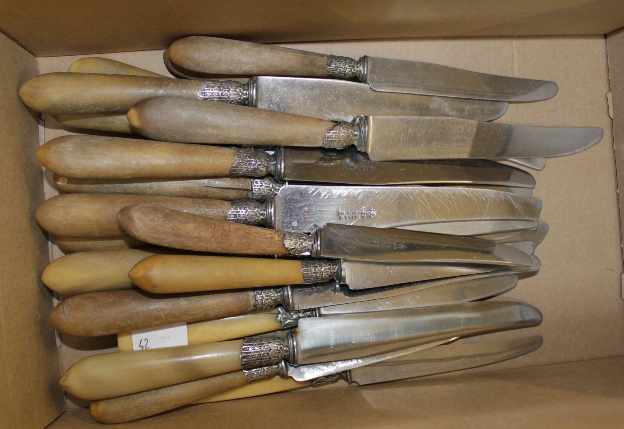 A selection of Continental bone handled steel bladed knives