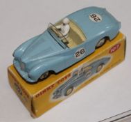 A Dinky No.107, Sunbeam Alpine Sports, blue, racing number `26`, cream ridged hubs, near mint,