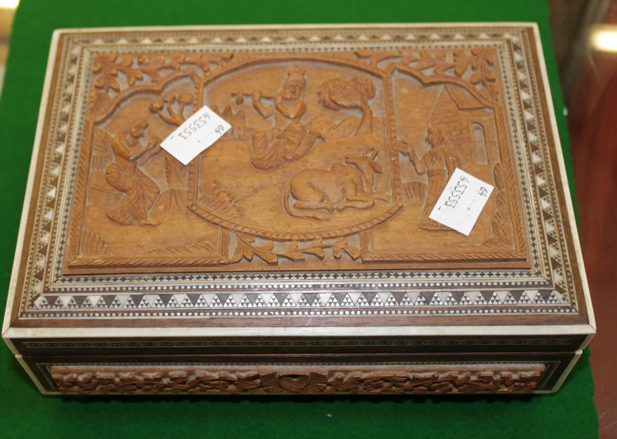 A carved decorative box with mother of pearl inlay and another box (2)