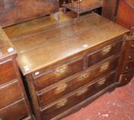 An 18th century and later oak chest of two short and two long drawers, 98cm