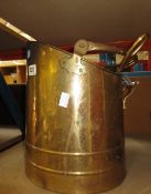 A brass coal bucket, a brass fan firescreen, a set of brass fireirons and a brass standard lamp (