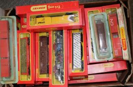 OO gauge - Thirty-three assorted Tri-ang Canadian Railway wagons and coaches, each boxed.