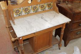 A Victorian pine marble topped washstand.102cm wide