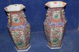 A pair of Chinese Famille rose hexagonal shaped vases, decorated with birds and insects amongst