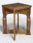 An Art nouveau mahogany card table 79cm high, 54cm wide
