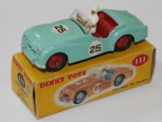 A Dinky No.111, Triumph TR2 Sports, pale blue, racing number `25`, red ridged hubs, near mint,