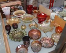 A mixed quantity of carnival glass items including a Wild Rose open edge green compote, an