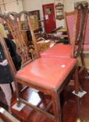 A pair of George II mahogany dining chairs and another similar