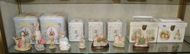 A quantity of Border Fine Arts Beatrix Potter figures with boxes, a Royal Albert `Ribby and the