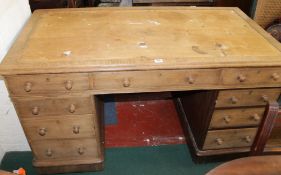 A 19th century oak pedestal desk 79cm high, 138cm wide