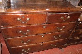 An 18th century oak chest of two short and three long drawers, 108cm wide