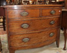 A 19th century mahogany bowfront chest with two short and two long drawers 103cm wide