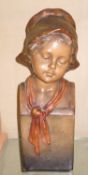 A Goldscheider bust of a young child on square base, stamp mark verso; approximately 29cm high