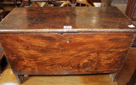 An elm boarded coffer with hinged top, 65cm