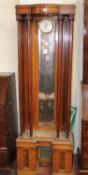 A Secessionist mahogany hallstand with aperture for barometer 193cm high, 66cm
