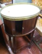 A French oval marble topped bouillotte table with a tambour slide