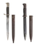 Two Second World War German Bayonets, complete with scabbards.